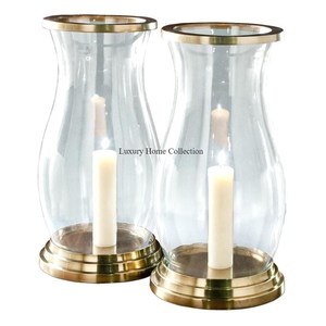 New Latest Pattern Design Attractive Look Gold Polished Metal Base & <b>Top</b> and Glass Made Candle Holder for Wax Stick & Lightning - Product Image 1