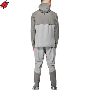 Vêtements de sport à blocs de couleurs OEM Ensembles de jogging unisexe avec veste zippée Ensemble deux pièces imprimé logo personnalisé Survêtements coupe-vent en nylon - Product Image 5