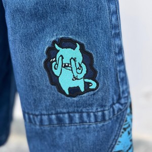Alta calidad Alphatek Baggy Jorts con impresión láser Diseño personalizado Pantalones vaqueros holgados de pierna ancha Pantalones vaqueros personalizados de cintura alta - Product Image 2
