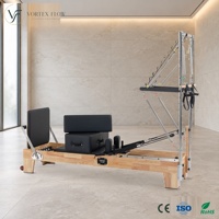 Vente en gros : Reformer Pilates demi-tourneuse de qualité commerciale, avec structure en chêne massif et support en alliage d'aluminium, pour studios et salles de sport