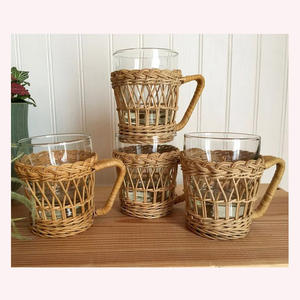 Wild Harmony Handcrafted Seagrass & Rattan Jug Base with Animal Designs A Luxurious Boho Accent for Hosting - Product Image 3