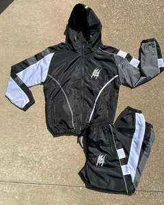 Diseño de sublimación de alta calidad, conjunto de chaquetas y pantalones cortavientos de nailon 100%, chándal deportivo, conjunto de chándal de entrenamiento para correr - Product Image 6