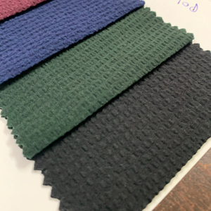 La mayoría de las telas de palomitas de maíz Polo de venta de ancho 58 para hombres y mujeres, ambas telas usadas de poliéster/tela de algodón para camisas - Product Image 1