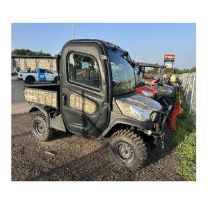 Vehículo utilitario Kubota RTV-X1100C disponible con transmisión VHT X, caja de carga con elevación hidráulica y ruedas de acero - Product Image 1