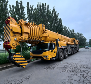 Grúa telescópica amarilla XCA1000G9-1 de servicio pesado con motor, bomba y engranajes, altura de elevación de 153 m para patios de construcción - Product Image 6