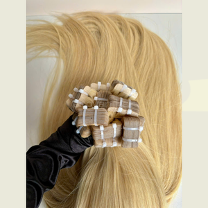 Cinta rubia en extensiones de cabello humano vietnamita técnica rusa procesamiento eslavo virgen textura suave y sedosa Exportación de fábrica - Product Image 1