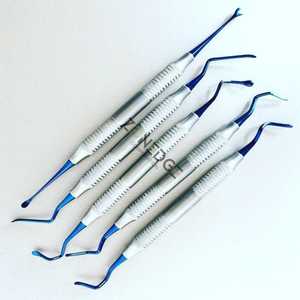 Ensemble d'instruments composites dentaires cliniques 4 pièces Kit de remplissage et de contour d'amalgame Instruments d'obturation dentaire personnalisables - Product Image 1