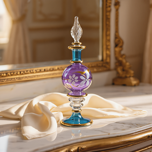 Botella de Perfume de Vidrio Soplado a Mano de Lujo, Egipto |   Diseño Artesanal Ecológico en Oro |   Forma Ovalada, Multi-Capacidad, Exportación a Europa - Product Image 1