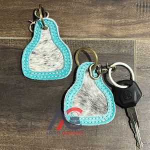 2025 tendance Unique élégant cuir de vachette porte-clés véritable fourrure de vachette cuir porte-clés élégant porte-clés véritable fourrure porte-clés - Product Image 1