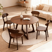 Table à manger ronde en bois moderne et combinaison de chaises 4 places écologiques pour le salon à la maison