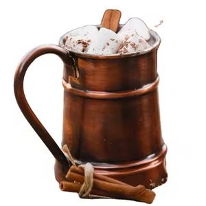 Taza de cobre hecha a mano con textura radiante que aporta sofisticación y brillo cálido a cualquier mesa - Product Image 1