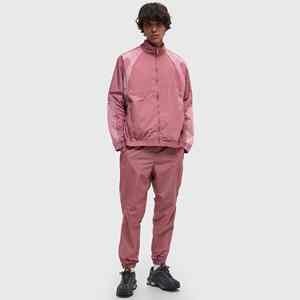 ชุดวอร์มกันลมสำหรับผู้ชาย คุณภาพสูง ขายดี ชุดแจ็คเก็ตและกางเกง กันน้ำ น้ำหนักเบา เหมาะสำหรับการเล่นกีฬาและฝึกซ้อม - Product Image 1