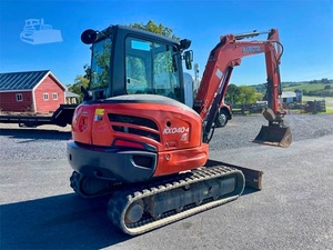 2023 pour la mini-pelle KX040-4 Kubota bien entretenue avec un mélange parfait de puissance et de commodité. - Product Image 4