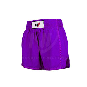 Nuevo estilo, pantalones cortos de Muay Thai hechos a medida, Color sólido con cintura elástica, cierre a media pantorrilla, hechos a mano en Pakistán - Product Image 1