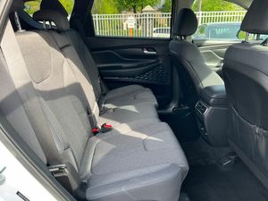 Blanco 2024 Hyunda-i Santa Fe SEL AWD con asientos de cuero Sistema de navegación Arranque remoto Techo solar Android Auto Llantas de aleación - Product Image 5