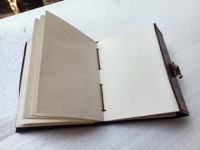 Journaux en cuir gaufré double dragon en relief personnalisés avec pages en papier fait main en coton