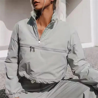 Ensemble de survêtements d'hiver deux pièces en polyester/nylon respirant et léger, avec doublure en maille unie et cordon de serrage, vente en gros