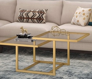 Table basse décorative en métal avec motifs découpés au laser ornés et un élégant plateau en verre trempé parfait pour les halls d'hôtel de luxe - Product Image 1