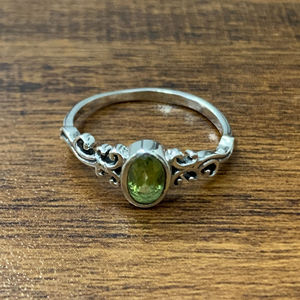 1.9 Grams <b>Peridot</b> <b>Ring</b> in Yellow Gold Oval Cut Natural Stone Gemstone Rhodium Plated with Elegant Setting for Everyday Wear - Product Image 1