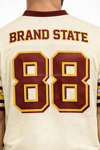 เสื้อฟุตบอลอเมริกันแบบใหม่มาแรง คุณภาพดีที่สุด ผลิตจากโพลีเอสเตอร์ 100% ชุดทีมสีพื้น แขนสั้น - Product Image 6