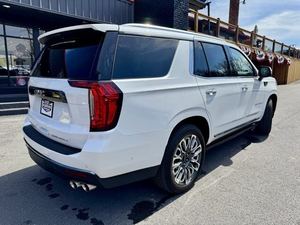Blanc 2024 GMC Yukon Denali Ultimate 4WD avec sièges en cuir Démarrage à distance Roues chromées Navigation Bluetooth Sièges de troisième rangée - Product Image 3
