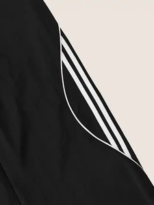 Nuevos pantalones cortavientos transpirables a rayas laterales para hombre, pantalones de secado rápido de verano informales para correr, pierna ancha con cordón, ligeros y holgados - Product Image 4