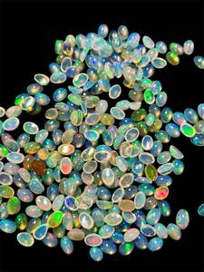 Cabujones de ópalo natural etíope 4x6mm Piedras preciosas sueltas blancas ovaladas Varias cantidades disponibles - Product Image 2