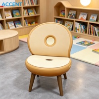 Fauteuil d'appoint en FRP en forme de donut mignon pour la décoration intérieure des salles d'enfants de maternelle, des crèches et des villas résidentielles