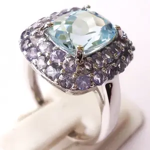Semi-precious gemstone combination Big Oval Sky Blue Topaz and small round tanzanite sterling silver ring gemstone silver rings