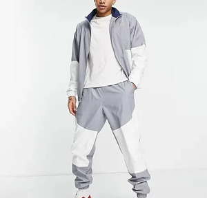 ชุดออกกำลังกายแบบใหม่ล่าสุด ชุดวอร์มแบบเรียบง่ายสำหรับทุกเพศ ชุดกีฬา ชุดวิ่ง ชุดแทรคสูท รับผลิตแบรนด์ส่วนตัว ชุดเทคแวร์ ชุดกันลม รุ่นปี 2026 - Product Image 2