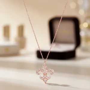 Theia Silver <b>Rose</b> <b>Gold</b> Plated 925 Silver Fleur De Lis Pendant <b>Necklace</b> with Round Brilliant Cut Diamonds Link <b>Chain</b> for Women - Product Image 2