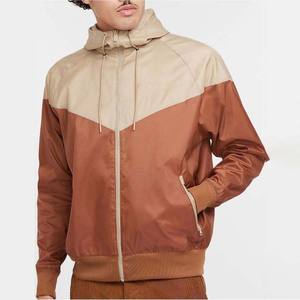 เสื้อแจ็คเก็ตกันลมผู้ชายแบบสีบล็อกผสมผสาน บริการ OEM ODM ผลิตตามสั่ง คุณภาพสูง 100% โพลีเอสเตอร์ กันน้ำ ระบายอากาศได้ดี - Product Image 1