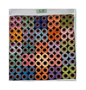 Fil de polyester filé pour des coutures fiables dans la fabrication de vêtements et la production textile industrielle - Product Image 1