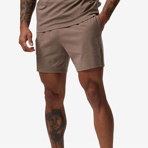 Conjunto de pantalones cortos deportivos para gimnasio con logotipo personalizado para hombre, camiseta ajustada ecológica, cierre de cordón de cintura media, posición frontal para correr - Product Image 1