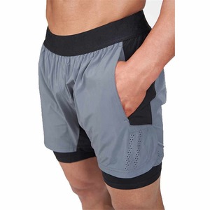 Pantalones cortos deportivos de secado rápido de doble capa informales para hombre al por mayor pantalones cortos de ejercicio de gimnasio para verano patrón liso teñido - Product Image 3