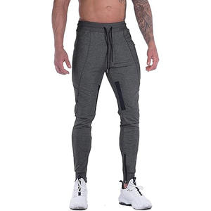 Pantalones informales de estilo europeo americano para hombre Pantalones de chándal de algodón de color sólido ajustados Pantalones de hombre fabricados por Dress Sports - Product Image 1