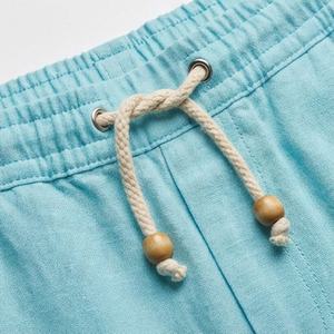 Pantalon en lin de couleur classique personnalisé avec des cordons de serrage en bois verni, design polyvalent, tissu respirant, vente en gros - Product Image 4