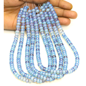 ลูกปัดควอตซ์ใสสีฟ้าสวยงาม รูปทรงกลมเรียบ ขนาด 7-8 มม. ลูกปัดพลอยควอตซ์สีเรียบ คุณภาพ AAA สำหรับงานฝีมือ - Product Image 1