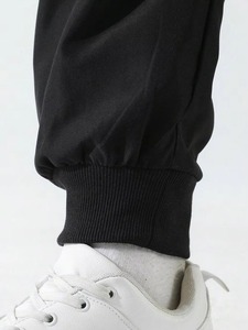 Custom Men's Sporty Streetwear <b>Oversized</b> <b>Sweatpants</b> made from Polyester Cotton with Elastic Mid Waist Loose Fit Pockets Design - Product Image 6