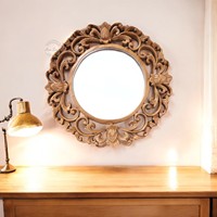 Miroir mural rond en bois sculpté à la main, luxueux et moderne, avec finition dorée pour la décoration de chambre à coucher