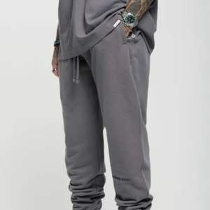 Pantalon de jogging gris 100% coton à revers en polaire Streetwear lourd avec ceinture élastique et poche zippée Style décontracté - Product Image 4