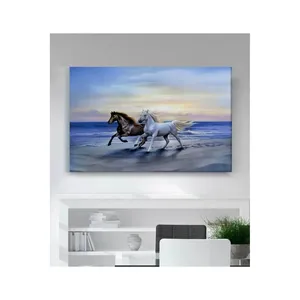 Impression sur toile de chevaux noirs et blancs courant sur la plage par Fida - Product Image 6