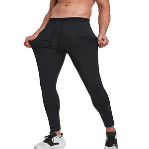 2025 nuevos pantalones de chándal de entrenamiento ajustados personalizados pantalones de chándal de algodón de alta calidad ropa de gimnasio ligera informal para hombres de talla grande plana - Product Image 1