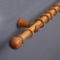 Support de rideau en bois de style indien traditionnel avec boiseries artisanales pour la décoration de rideaux dans des intérieurs ethniques