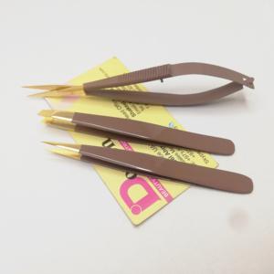 Brown Color Coated With Gold Plated Tips Eyebrow Tweezers Custom Logo Sustainable Steel Slanted Pointed Tips With Spring Scissor - Product Image 1