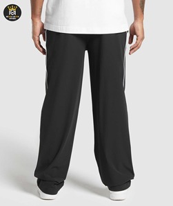 กางเกงวอร์มขายาวผ้าคอตตอนขาบานแบบเรียงซ้อน - Product Image 2