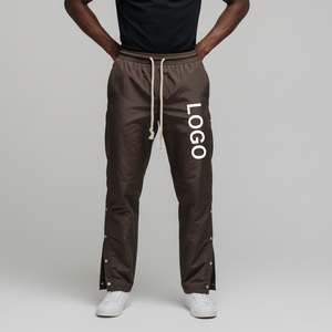 Pantalon de survêtement décontracté pour homme en toile de coton premium, respirant, écologique, imperméable, coupe ample, avec boutons latéraux, cordon de serrage en corde, effet délavé, pour le sport - Product Image 1