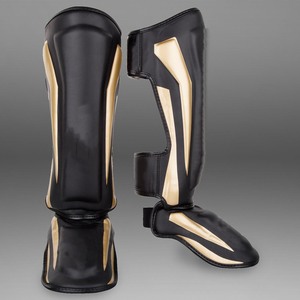 Espinilleras Juveniles Ligeras de Cuero para Muay Thai, Boxeo, Kickboxing, Karate, MMA con Logotipo Personalizado - Product Image 1