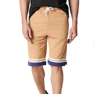 Shorts de plage pour homme, couleur unie, avec cordon de serrage à la taille et poches latérales, séchage rapide, tissu Oxford, style décontracté. - Product Image 5