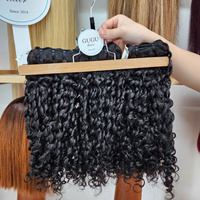 Paquets noirs naturels Pixie bouclés avec fermeture à lacet frontal Extension de cheveux humains vietnamiens couleur naturelle prix de gros